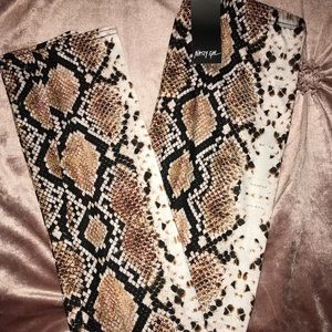 Brand new, never worn snakeskin print leggings.